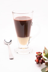 Black coffee.Sweetened condensed milk  in clear glass on a white background in the studio.	