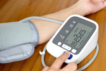 Human check blood pressure monitor and heart rate monitor with digital pressure gauge. Health care...