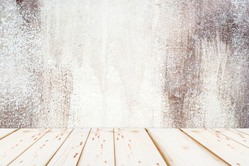 grunge concrete wall surface and wooden table top