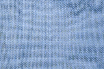 Closeup blue hessian fabric texture background, blank blue fabric texture background