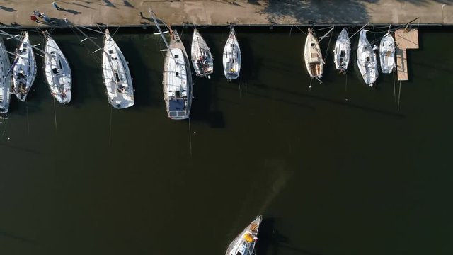 Aerial top view of a sailing yacht regatta. Flying over boats. 4k video 