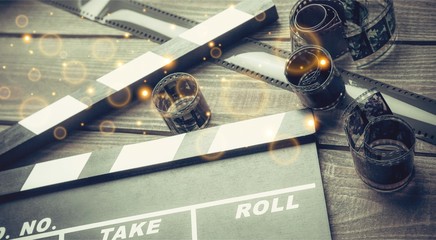 Clap board on wooden background