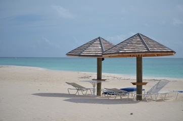 Fototapeta premium beach with chairs and umbrellas