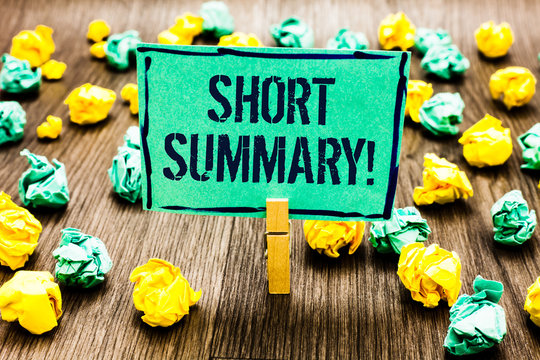 Conceptual hand writing showing Short Summary Motivational Call. Business photo showcasing Brief statement of main points clear Crumpled papers ideas mistakes paperclip clip objects wood