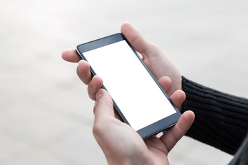 Man uses his mobile phone outdoor.