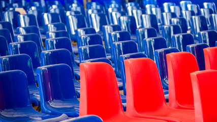 Rows Of Red And Blue Empty Plastic Seats At The Event. Blue Wave, Democratic Election Concept.