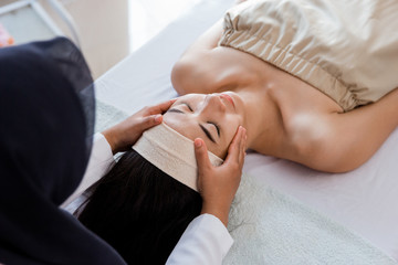 Young woman enjoying massage