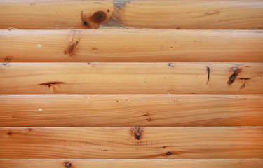 Texture of brown wooden planks as background.