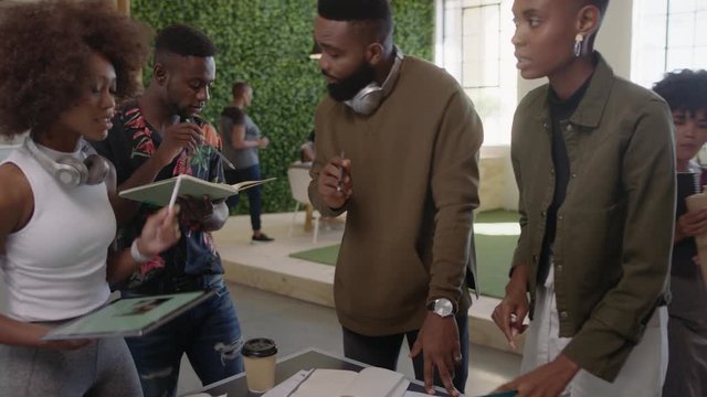 professional african american business people brainstorming creative team sharing ideas office manager businessman collaborating with colleagues working together in trendy workplace