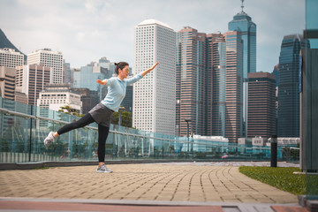 Fototapeta na wymiar Woman doing workout in Hong Kong