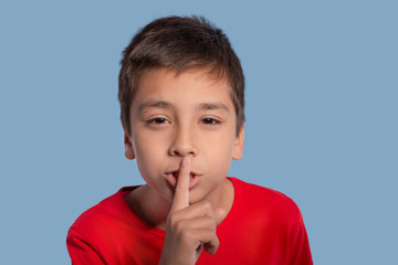 Fototapeta premium The boy asks not to talk about the secret