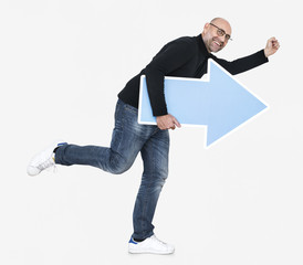 Happy man holding blue arrow icon
