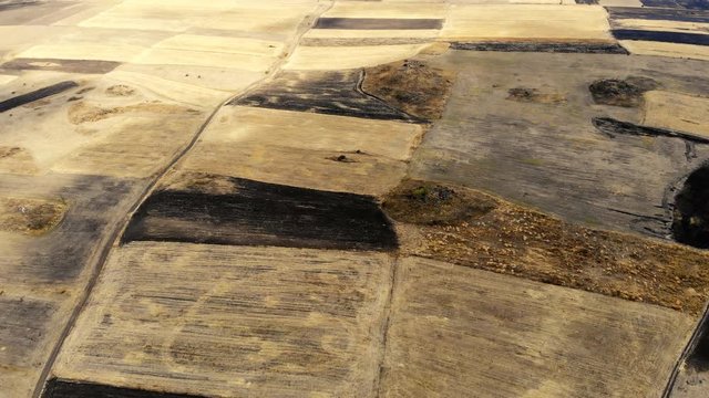 Flying over fields devastated by drought