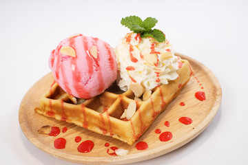 Homemade waffle with strawberry ice cream
