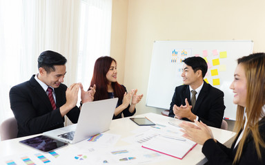 Happy group of young Asian businesspeople clapping in office.people joining for cooperation and relationship success business, win in everything,Applause Appreciation Award Cheerful Meeting Concept