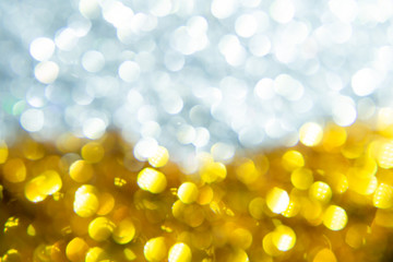 Silver and golden bokeh Background.