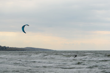 Skysurfer on a stormy sea