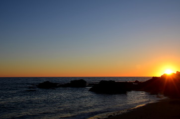 Obraz premium Sunset in Coves of Roche, Conil de la Frontera, Cadiz