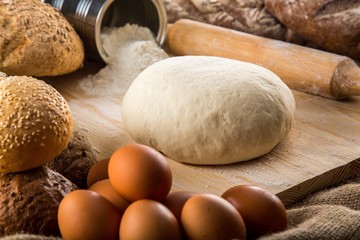 Bread Dough with Ingredients and Rolling Pin