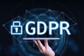 GDPR Concept,Businessman hand holding digital tablets sign general data protection regulation and key icon, Cyber security and information privacy,25 may 2018.
