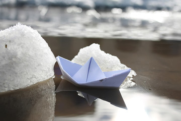 paper boat in a pool