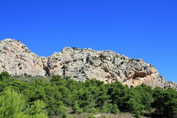 Fototapeta na wymiar sandstone escarpment with cave