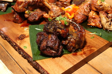Tasty Meat on Wood Cutting Board