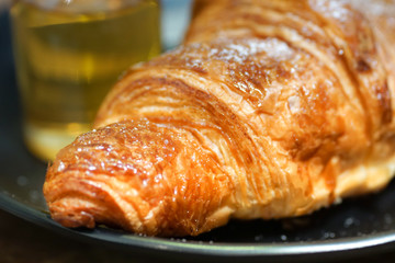 croissants with honey on plate close yummy