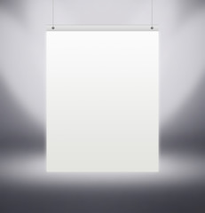 vertical white poster hanging on the grey wall in the Studio, illuminated by spotlights. Template mock up for display of product or your content. backdrop.