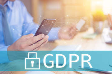 GDPR Concept,Businessman hand holding digital tablets mobile smartphone sign general data protection regulation and key icon, Cyber security and information privacy,25 may 2018.