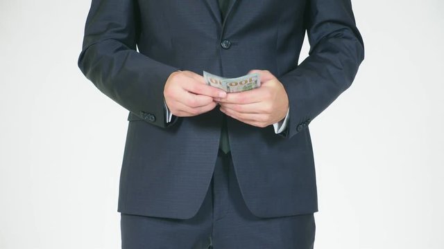 the concept of mediation and speculation. a person acquires an amount of money and gives less to the workers. The rest is taken away. 4k, slow motion