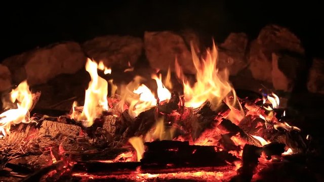 Bonfire burning trees at night. Bonfire burning brightly, heat, light,camping, close up
