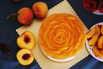 Peach mousse cake served with peaches