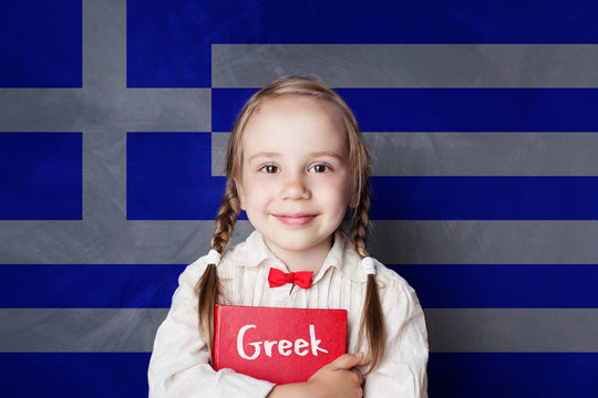 Greek language concept. Happy litte child student with book against the Greece flag background. Learn language