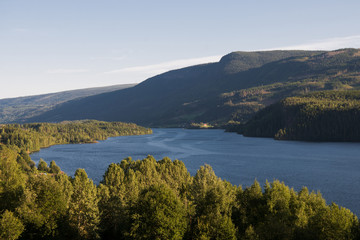 aerial view of lake, green trees and mountains, Hallingskarvet National park, Norway
