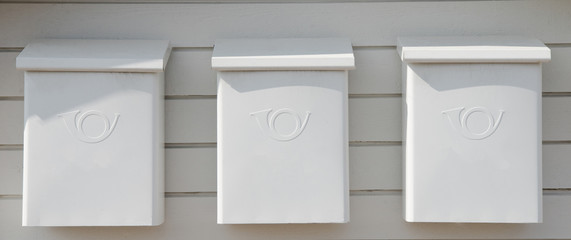 three white post boxes placed in row in Trysil, Norway's largest ski resort