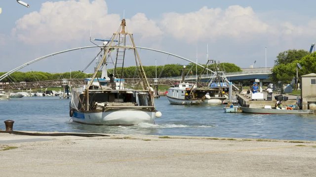 Marano lagoon time lapse The port of the fishermen with the bridge