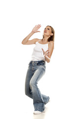 Fototapeta premium young pretty woman in deffence position on white background