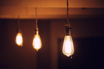 Lamps with tungsten filament. Edison's light bulb. Filament fila