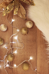 Gold Christmas balls and lights. Winter holidays concept