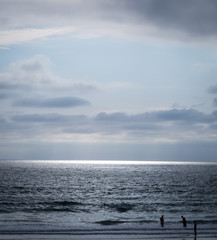 Fototapeta premium Early mornings at the beach side town and shore are misty, and cooler and gives the beach a whole different look than when its mid day and the sun is blasting and folks are up and around