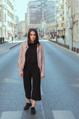 Obraz premium Beautiful young woman tourist exploring European city streets during city break vacation 