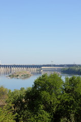 Fototapeta na wymiar DneproGES. Hydroelectric power station on Dnieper River in Ukraine. Creation of electricity on water