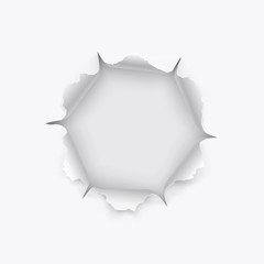 Torn hole in paper with ripped edges with shadow on transparent background. Graphic concept for your design.