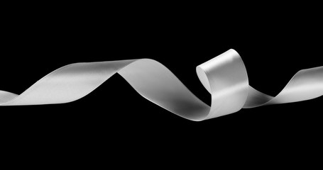 White ribbon isolated on black background and texture