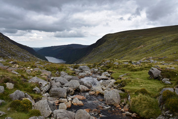 Irish mountain landscape stock images. A beautiful irish mountain landscape with a lake in summer. Ireland mountains landscape scenic green scenery