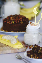 chocolate-pistachio cake served with cream