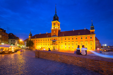 Naklejka na ściany i meble Royal Castle in Warsaw city at night, Poland