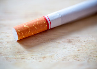 Close up cigarette butts on wood background. image for background, wallpaper, copy space. sigh of World No Tobacco Day and lung cancer.