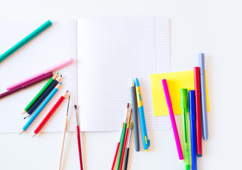 pencils markers stationery for schooling on the table